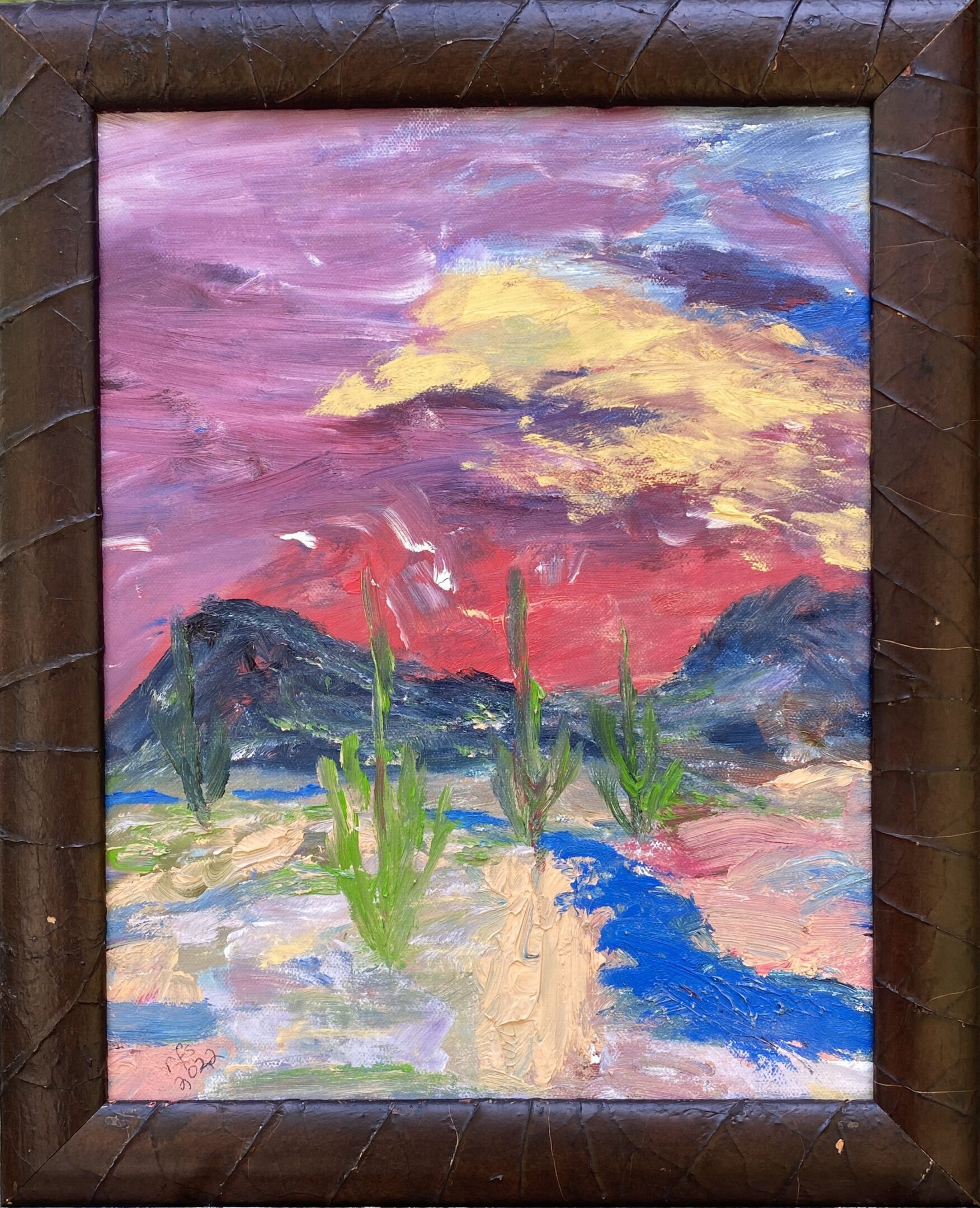 Desert landscape painting with colorful sky.