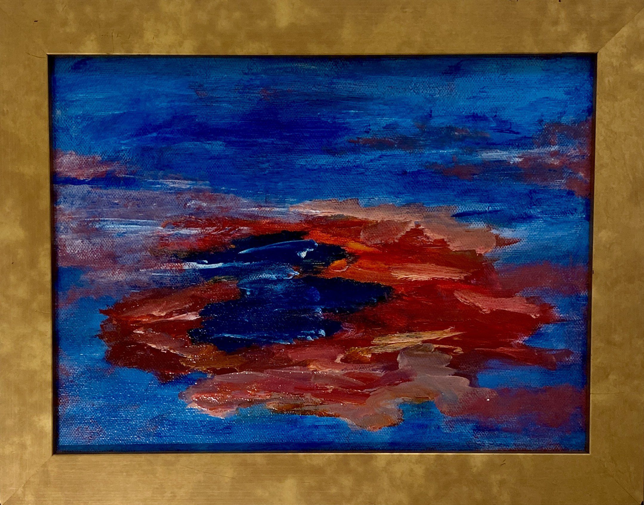 Abstract painting with blue and red hues.